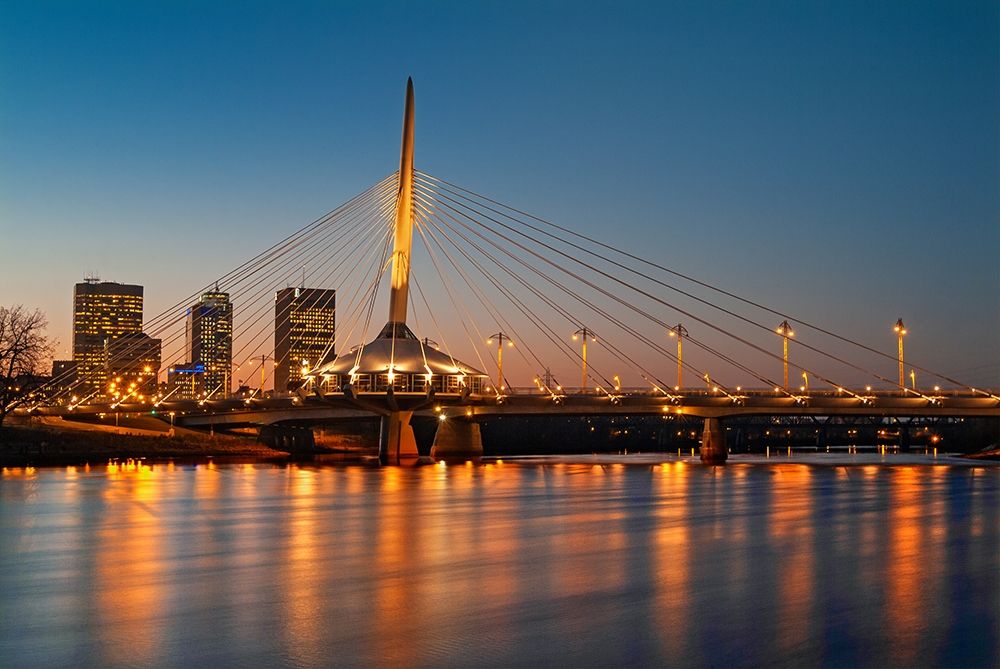 Canada-Manitoba-Winnipeg Esplanade Bridge over Red River at sunset
